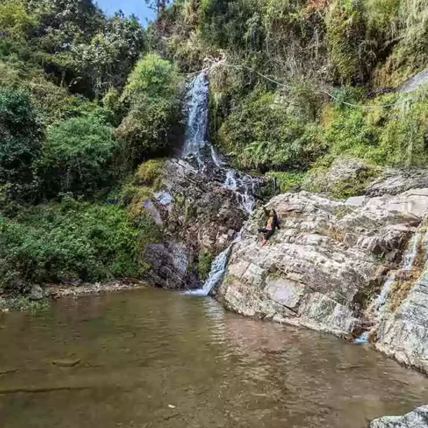 Trek through the scenic Letibunga Village to the waterfall down the hill