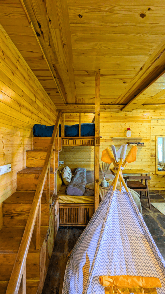 Staircase leading to the single bunk bed